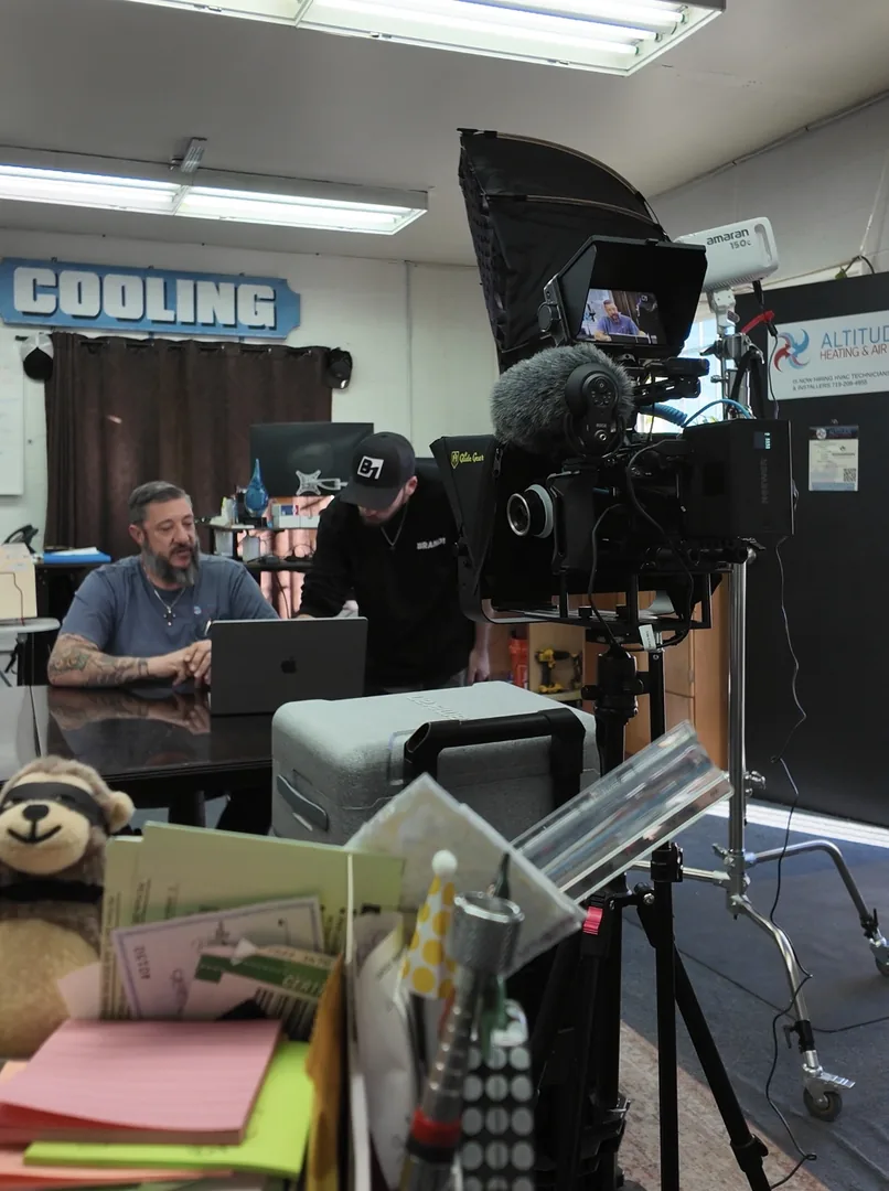 Brandon Easton setting up an on-location interview with a client in his office